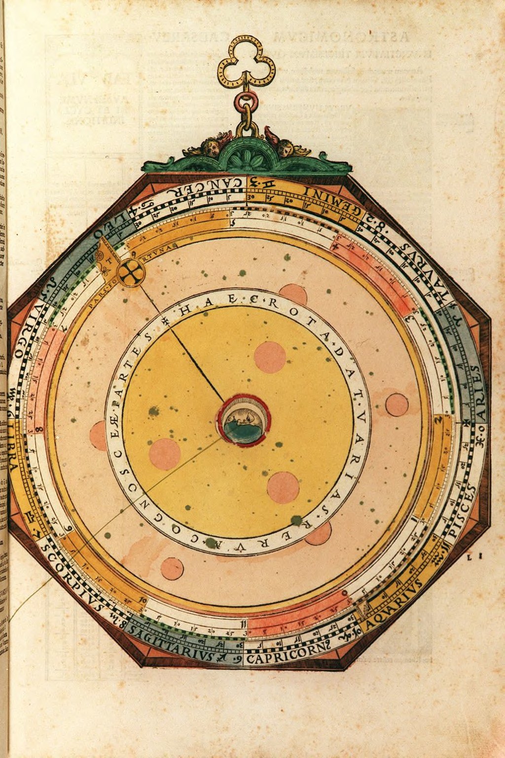 A public-domain page from Peter Apian's Astronomicum Caesareum showing a rotating paper volvelle.